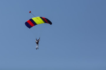 Paraglider flying in summer day