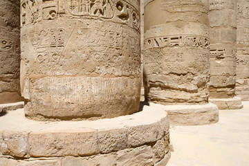 Close up of columns covered in hieroglyphics, Karnak, Egypt.