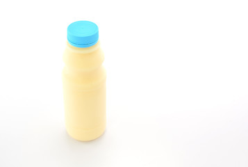 Milk Bottle with blue cap on White Background