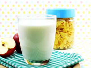 morning breakfast with fresh apple cornflake and milk selective focus