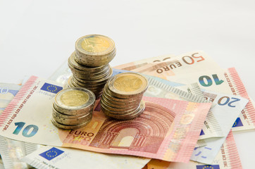 euro banknotes and coins