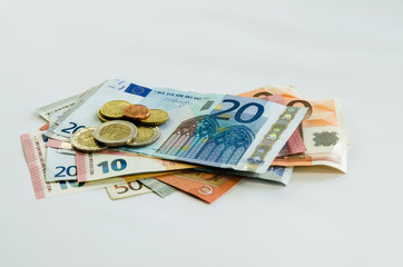 euro banknotes and coins