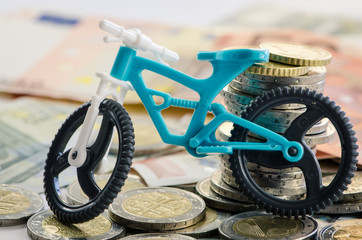 bicycle, coins and banknotes