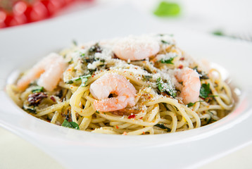 Italian pasta aglio olio with sea fruit