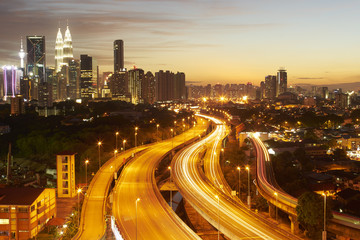 Fototapeta na wymiar Dramatic scenery of the Kuala Lumpur city at sunset