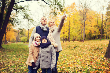 Fototapeta premium happy family in autumn park