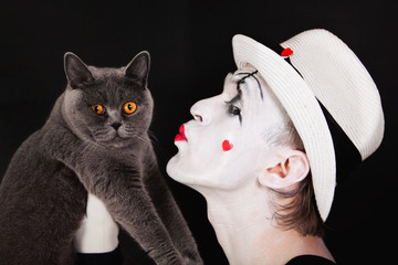 mime with a gray British cat