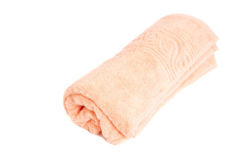 Pink towel isolated on white background