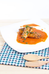 Canned fish in tomato sauce