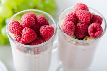 Glass of dessert with yogurt, fresh berries and muesli