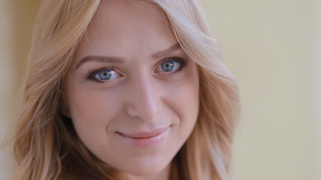 Close up portrait of blond young woman