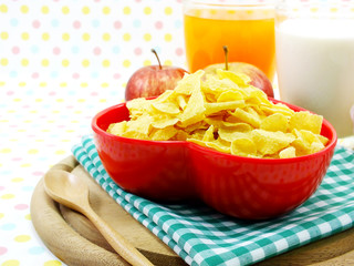 morning breakfast with fresh apple cornflake and milk selective focus