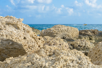 Waves crashing against the rocks at the beach on the Mediterranean island of Cyprus.