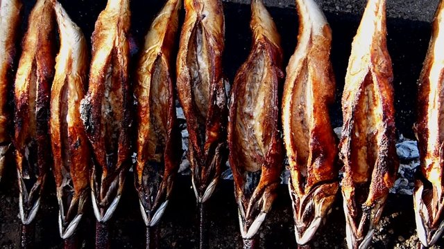 Traditional bavarian "Steckerlfisch" on the Oktoberfest, Munich, Germany