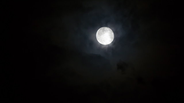 Moon moving with cloudscape