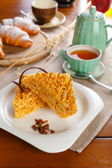 Cake slices served with tea