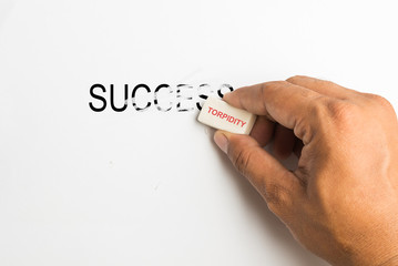 The concept "Laziness is a barrier to success" Handle eraser to remove the word success