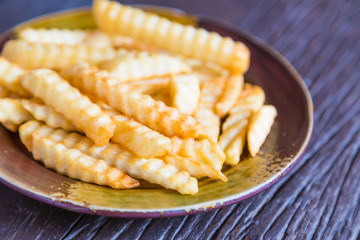 French fries on wood table