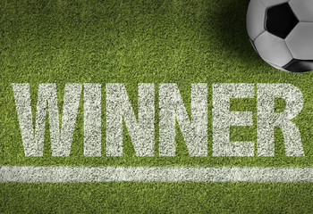 Soccer field with the text: Winner