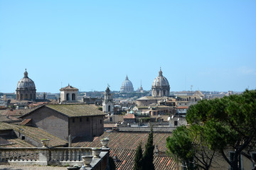 Fototapeta na wymiar domes and rooftops of Rome
