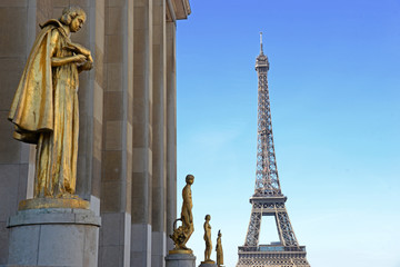 Fototapeta na wymiar view from Trocadero with golden statues on Eiffel tower, Paris
