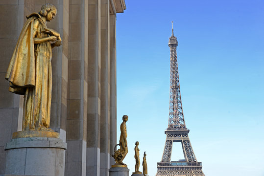 view from Trocadero with golden statues on Eiffel tower, Paris