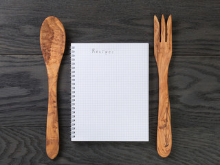 simple blank notepad with word recipe on rustic wood table