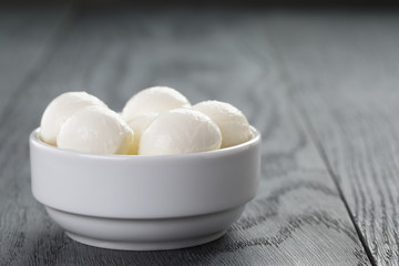 small balls of mozzarella in bowl