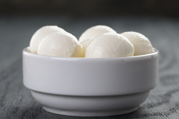 small balls of mozzarella in bowl