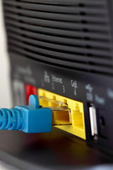 Router modem internet cable.
Home broadband router with cable.