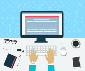 Top view of workplace. Enter of content on the computer