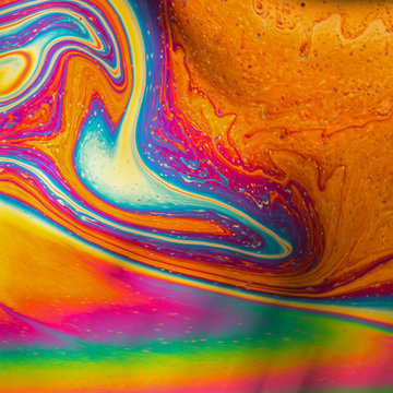 Psychedelic patterns formed on the surface of soap bubbles