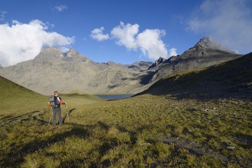 Obraz premium A lone hiker - Col de Lanserlia, 2774 m, Vanoise national park, France
