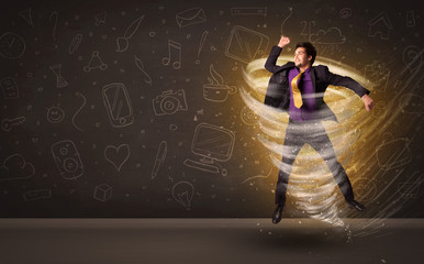 Happy businessman jumping in tornado concept