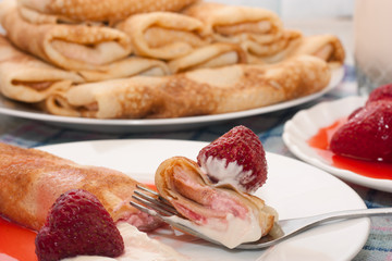 Delicious pancakes with strawberries