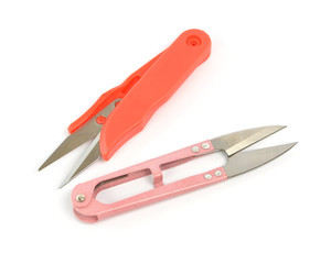 Scissors for thread cutting isolated on white background