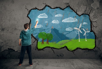 Young urban painter drawing