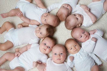 cute babies on light background
