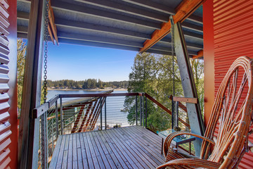 Covered porch of amazing lake house.