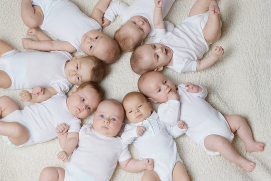 cute babies on light background