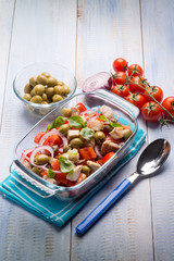 fish salad with swordfish tomatoes green olives and onion