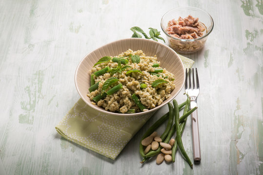 cold rice salad with tuna greenbeans almond and mint