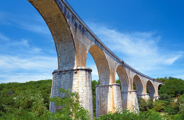 Stone, Railway viaduct over the River Ardeche in France.