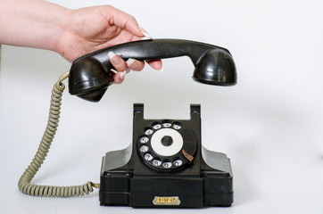 old black vintage phone isolated 