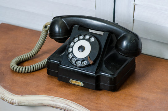 old black vintage phone isolated