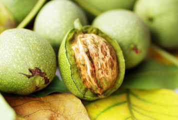 Green walnut, peeled and leaves
