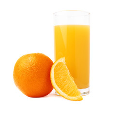Tall glass filled with the orange juice and fruits, composition