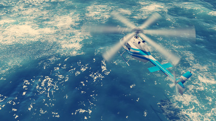 Rescue helicopter flies over stormy ocean surface © Marsea