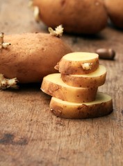 potato sprouted on a wooden vintage