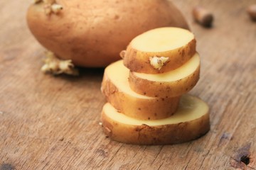 potato sprouted on a wooden vintage
